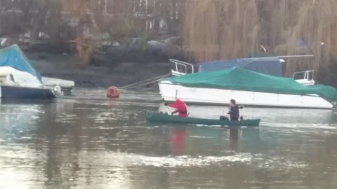 Two guys in the Thames