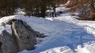 Guy black outfit ski fail slow motion