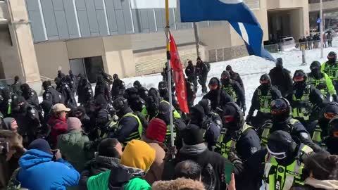 Canadian Police Assaulting Peaceful Protester With Butt of Rifle