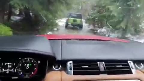 Range Rover Sport CHASING a LIFTED Jeep Wrangler JL down a snowy river