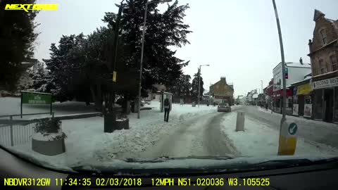 Car driver having fun in the snow
