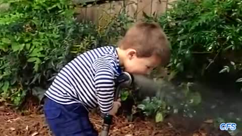 Kids Trying to Drink Water From Hose