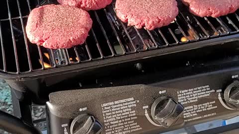 Grilling burgers on a Sunday