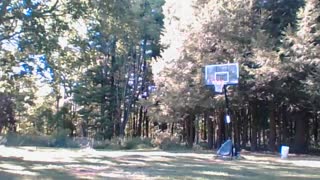 Shooting threes in backyard.