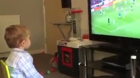 See how a baby reacts to a goal scored by its favourite football team