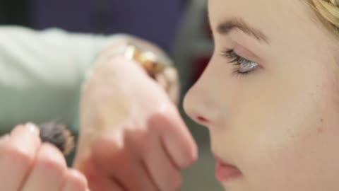 Woman Applying Makeup