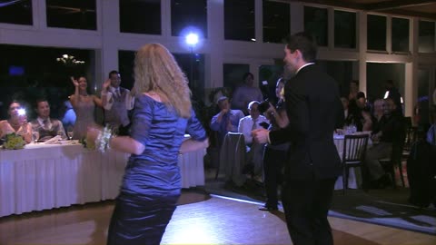 Mother and son entertain wedding guests