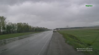 Car Loses Control on Wet Roads