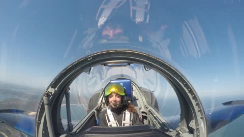 Amelie Windel, female aerobatic pilot flies an L-39 Albatross over Sydney's Northn Beaches.