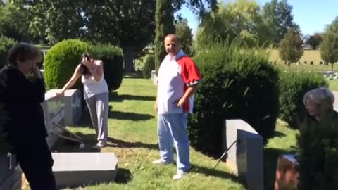 Bumbling Man Knocks Over Gravestone Trying To Plant Flowers