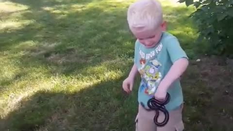 Boy Catches Garden Snake and Gets Bit