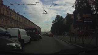 City Bus Destroys Cars at it Pushes Through Traffic