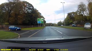 Car Nearly Spins Out into Oncoming Traffic