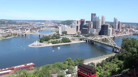 Pennsylvania cityscape flyover high-rise buildings train