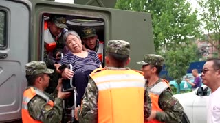 Beijing evacuates more flood-affected residents
