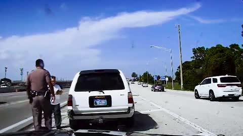 Florida Cop And Motorist Jumped To Safety As Car Crashes Into Stopped SUV On Interstate