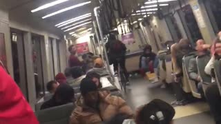 Man rides his bike through bart train