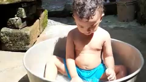 Baby bath, bath in pot, funny baby