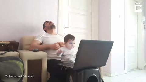 -Baby Distracts Dad From Working From Home-