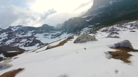 Footage of a mountain landscape with snow