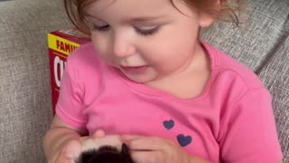 Little Girl Reacts to Holding Tiny Puppy