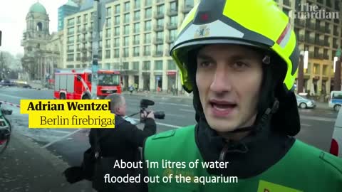 Huge aquarium bursts open wrecking Berlin hotel lobby