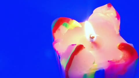 Fluorescent cube candle