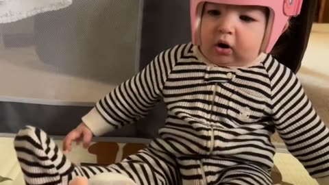 Baby Stunned by Talking Hamster Toy