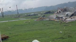 Tornado Winds Destroy Roofs and Scatter Debris