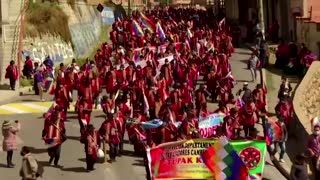 Hundreds march to support Bolivian President Luis Arce