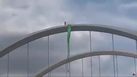 Abortion Supporter Protesting From Top of Frederick Douglas Bridge