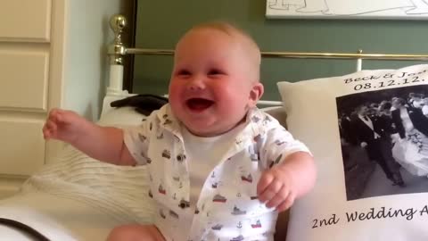 Laughing and giggling infant