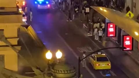 Chaotic Scene Unfolds in Downtown Chicago as Teenagers Vandalize Cars and Gunfire Erupts