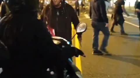 BLM Member takes a helmet to the dome after wielding a knife