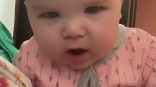 Baby Adorably Realizes She's Watching Herself On Camera