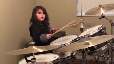 Little Girl Plays The Drums