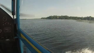 Floatplane taking off and landing at Georgian Bay base.