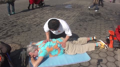 Luodong Massages Older Man In Tie-Dye Shirt