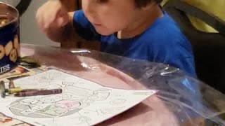 Kyle coloring and singing