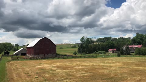 Peaceful Time Lapse Video on Moving Clouds at the Farm