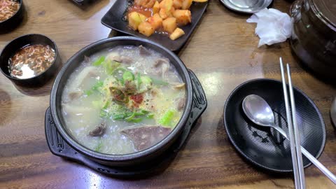 Korean sundae soup(Korean sausage soup) boiling in a hot earthen pot