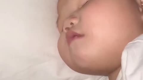 Small child seen sleeping dream very lovely and beautiful heart movement