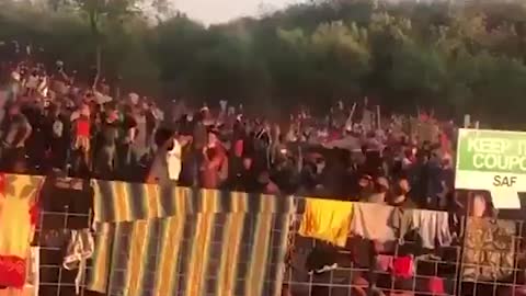 Close up view of immigrants at the Del Rio International Bridge