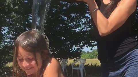 Bucket challenge - 9 years girls gets wet