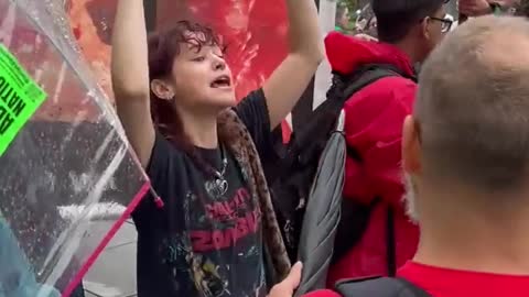 Young Demon Screaming "We Love Killing Babies" in Front of White House