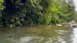 Man first swimming in the river