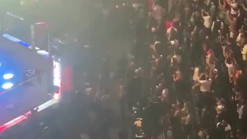 Crowd chants USA as President Donald Trump makes an appearance at UFC 264 in Las Vegas