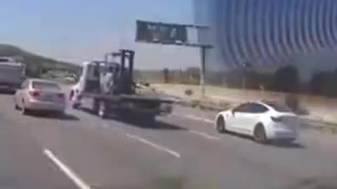 Tow truck crash caught on video in Pomona, California.