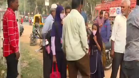 Muslim teachers & students publicly humiliated to remove their Hijab before entering school in India