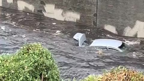 Los Angeles Area: Cars get washed away by Hurricane Hillary flooding